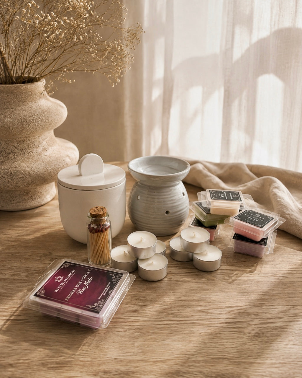 Pack Lumière completo con quemador de cerámica, velitas de té, bote de cerillas de cristal y productos aromáticos